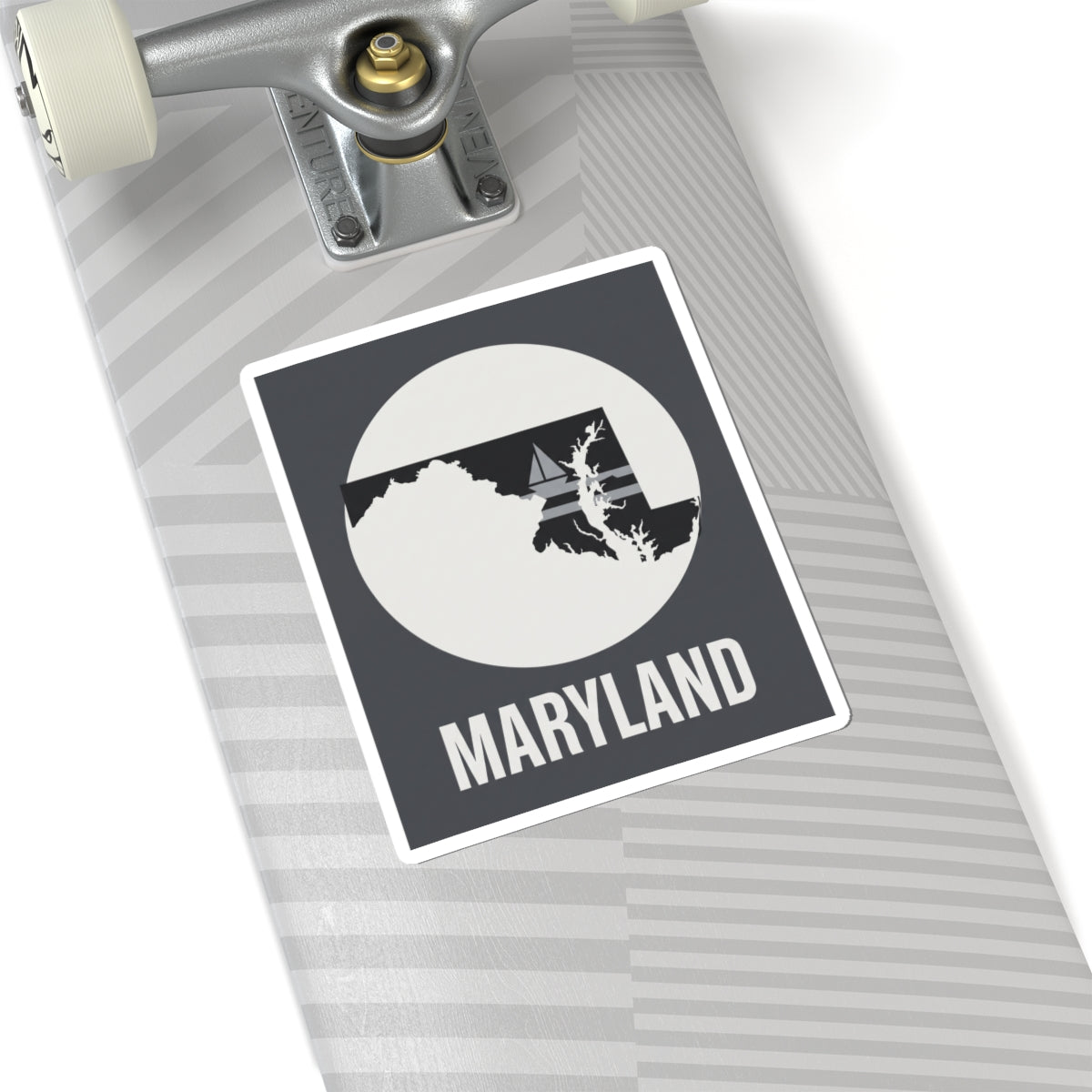 Maryland kiss-cut sticker on a luggage tag, showing circle state silhouette and “MARYLAND”