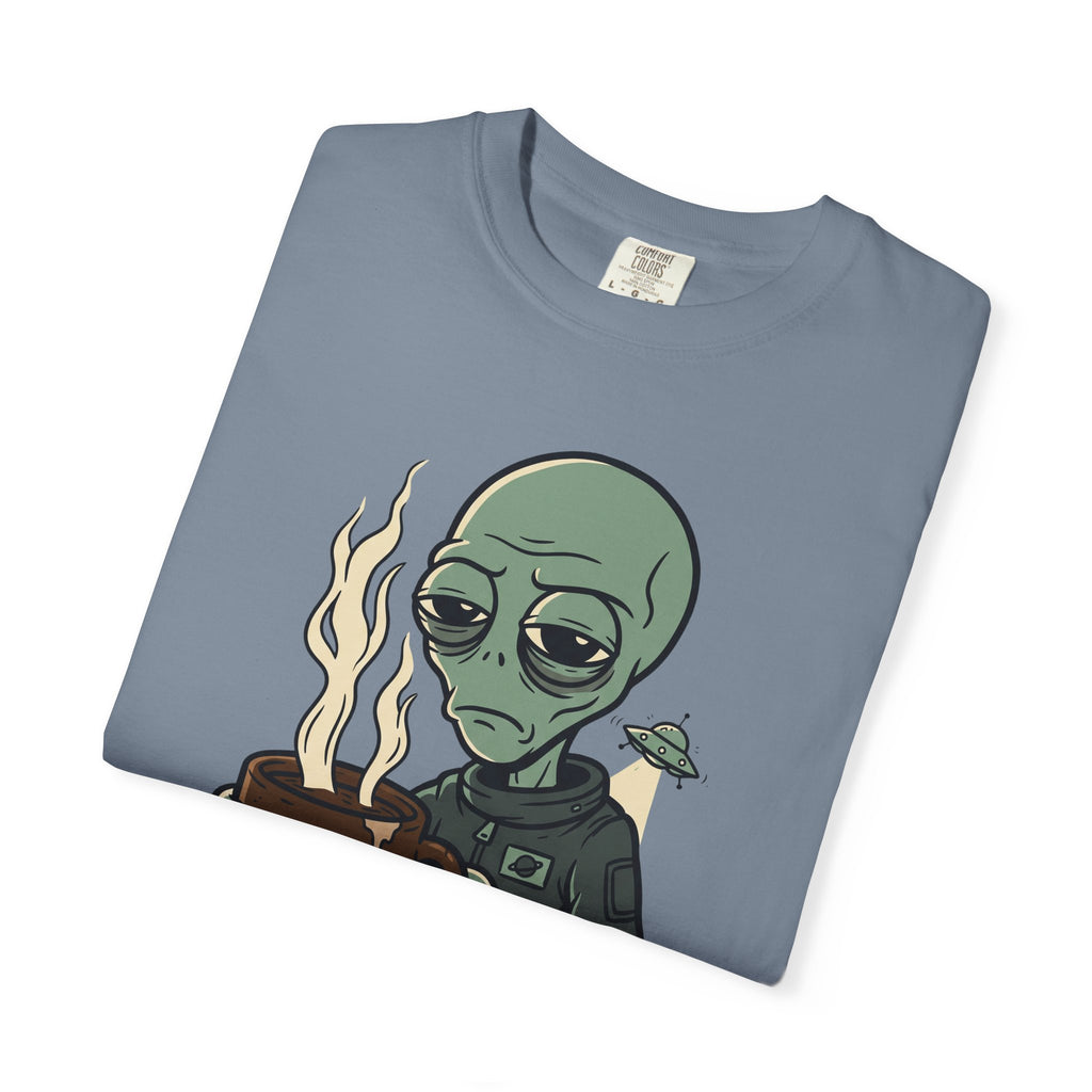 Blue alien coffee T-shirt with cartoon space figure and flames graphic