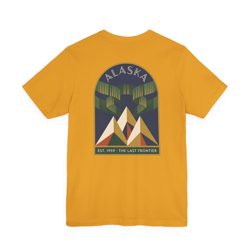 Mustard yellow graphic T-shirt with Alaska aurora badge and mountain design