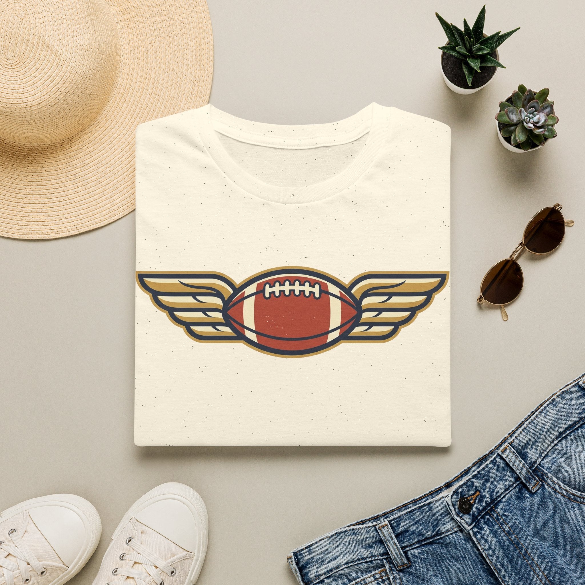 Off-white crewneck t-shirt with winged football graphic on the chest
