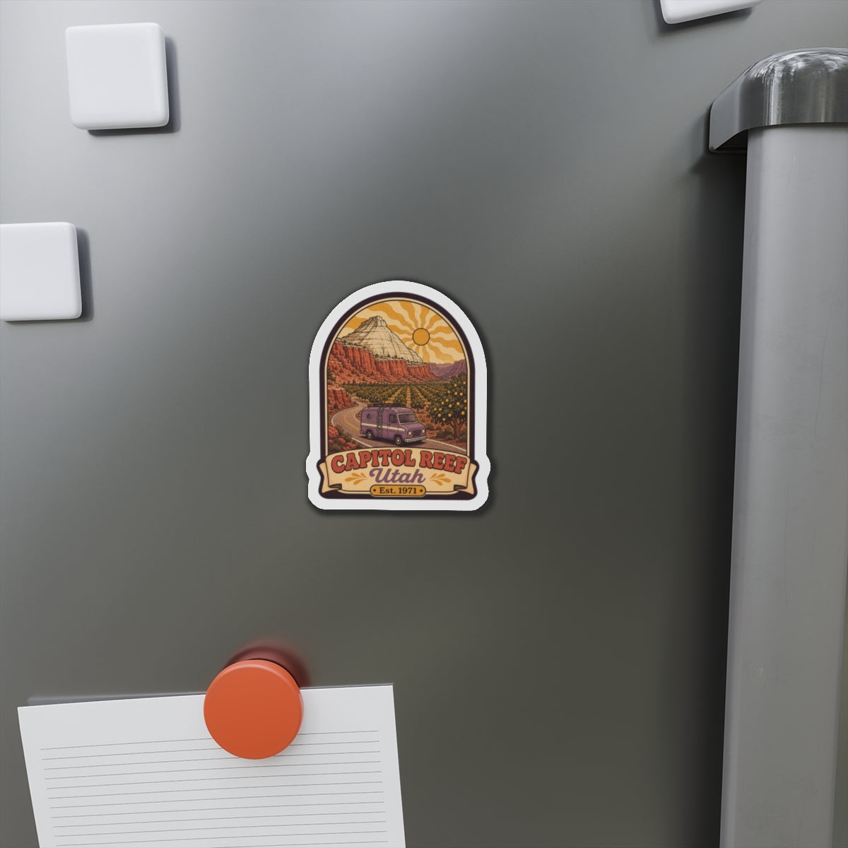 Capitol Reef die-cut magnet on gray fridge door, purple camper and canyon landscape
