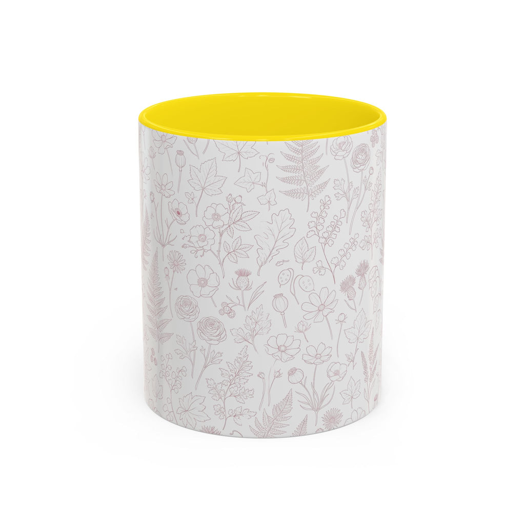 Floral wildflower pattern accent mug with yellow interior and rim, white exterior