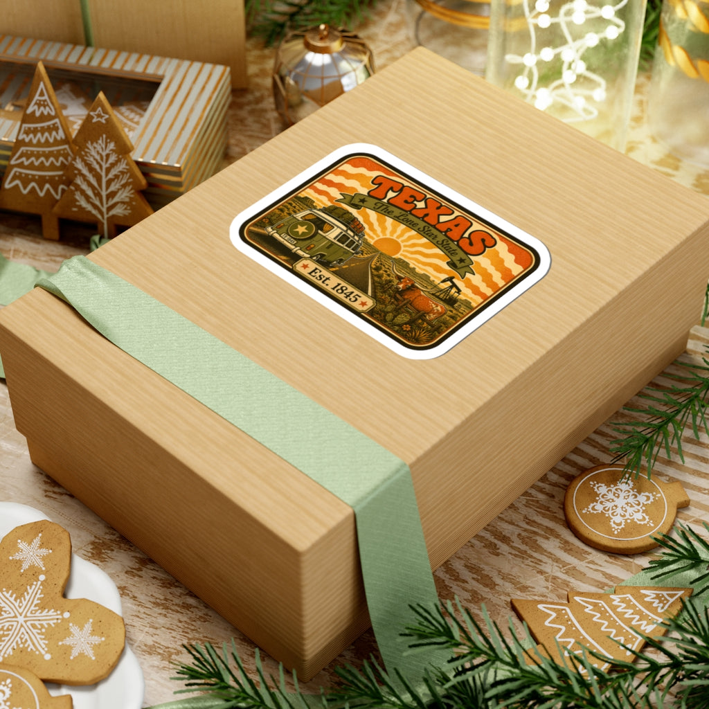 Kiss-cut Texas sticker on wooden gift box with teal ribbon and greenery