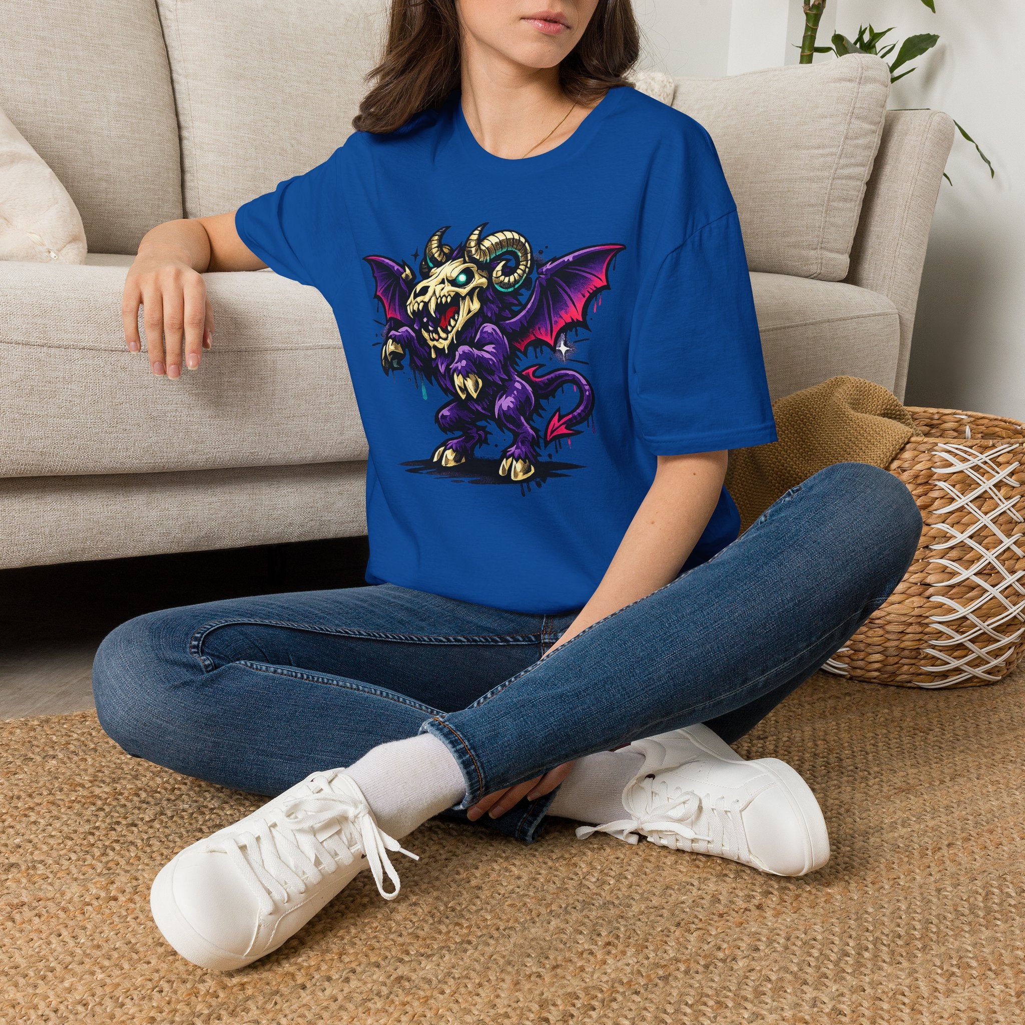 Royal blue graphic monster T-shirt with purple bat-winged skull ram front print