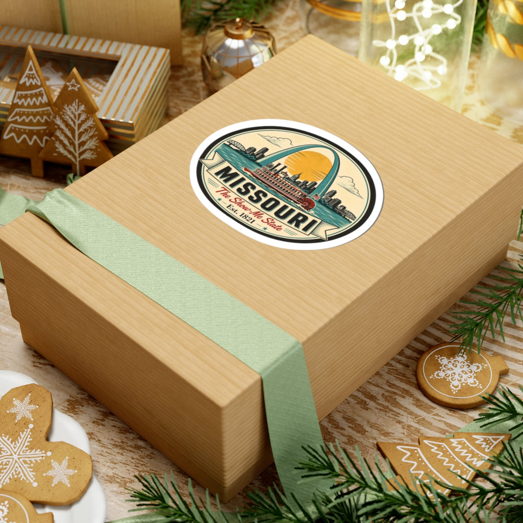 Round Missouri vintage sticker centered on kraft gift box, Gateway Arch and paddleboat graphic.