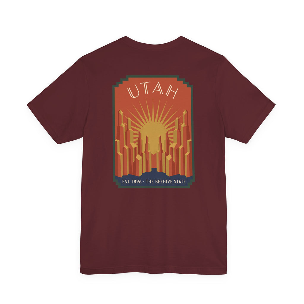 Maroon T-shirt with Utah sunrise art deco square graphic, UTAH text and skyline