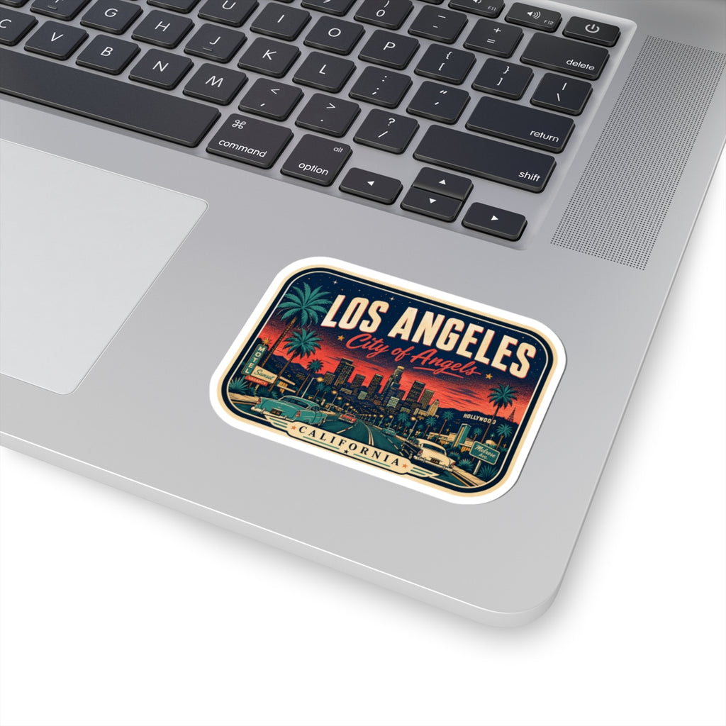 Luggage tag sticker on laptop lid with Los Angeles skyline and “City of Angels” text