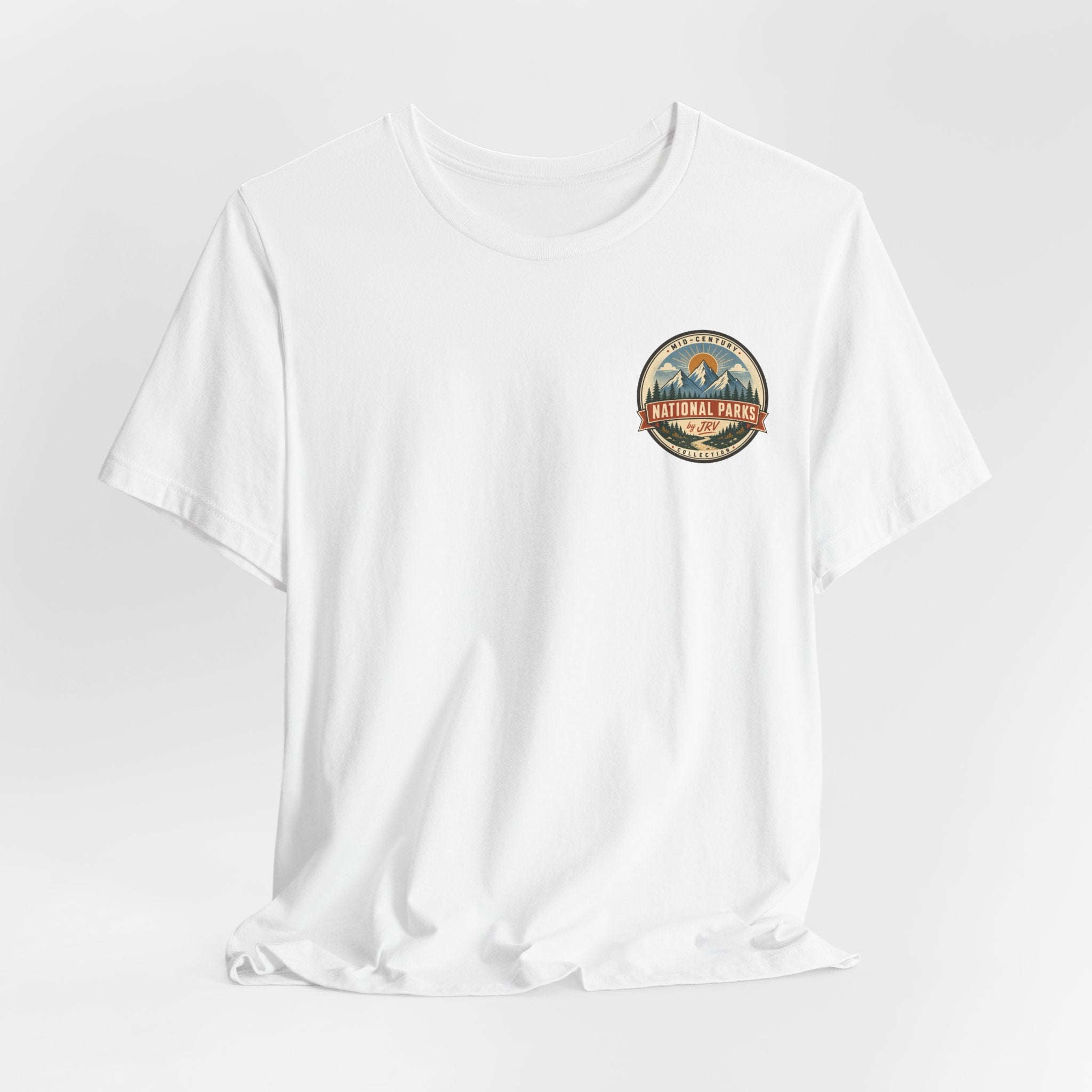 White T-shirt with small circular National Park badge on chest