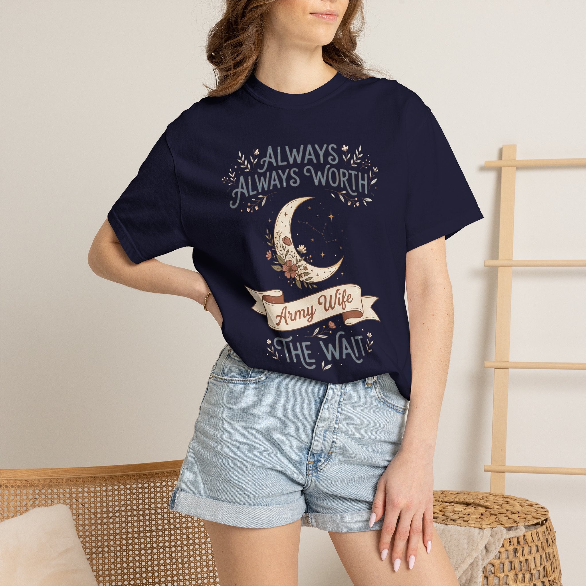 Navy T-shirt on model with crescent moon and “ALWAYS WORTH” design