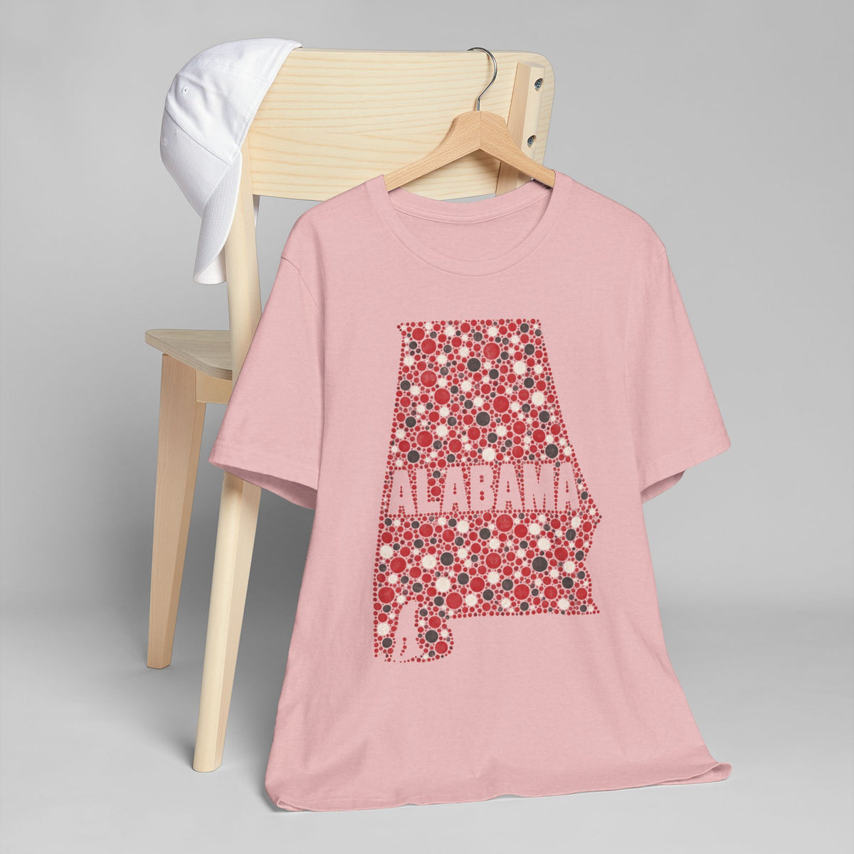 Pink crew-neck T-shirt with red Alabama floral state outline graphic