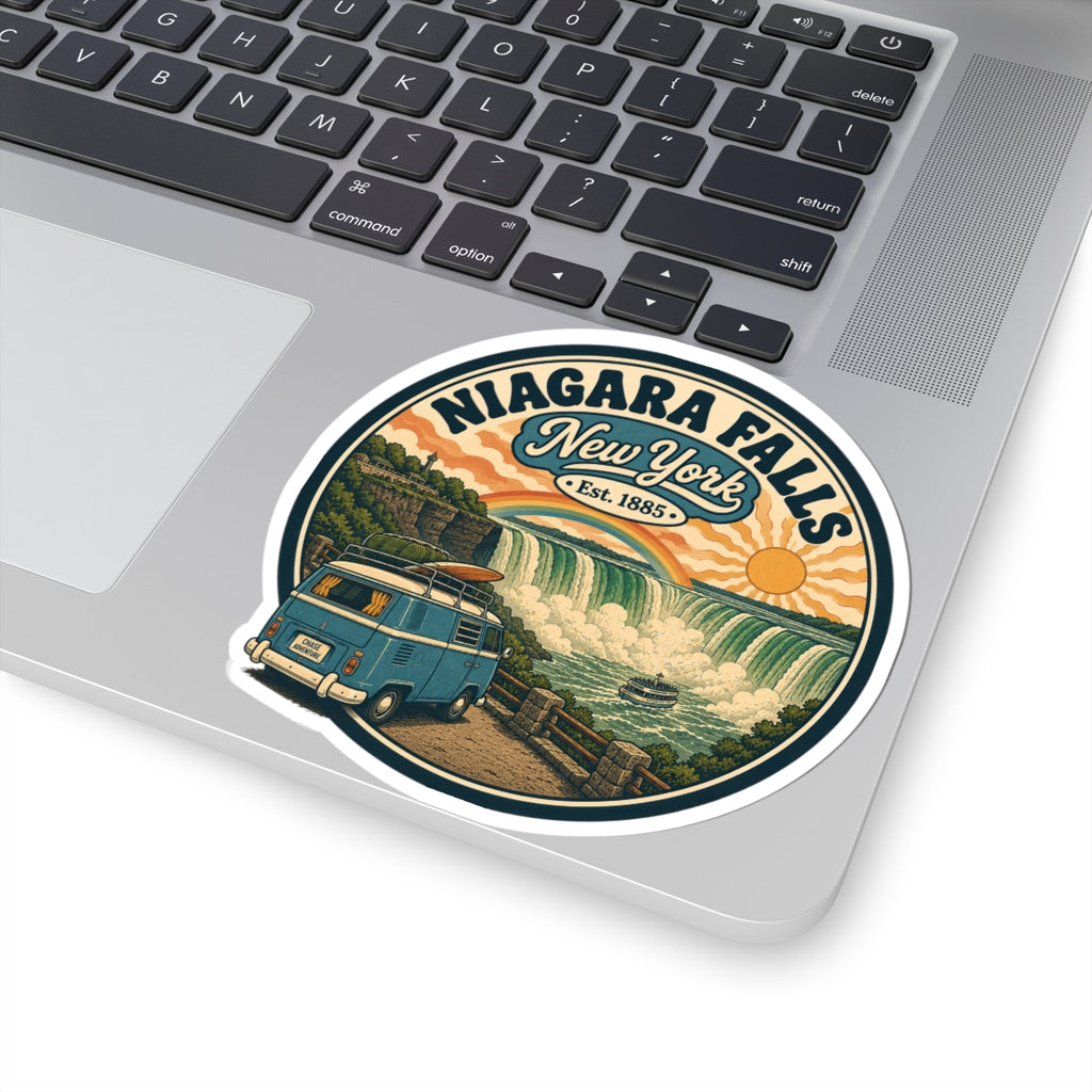 Round white kiss-cut sticker on laptop showing Niagara Falls New York vintage camper and falls