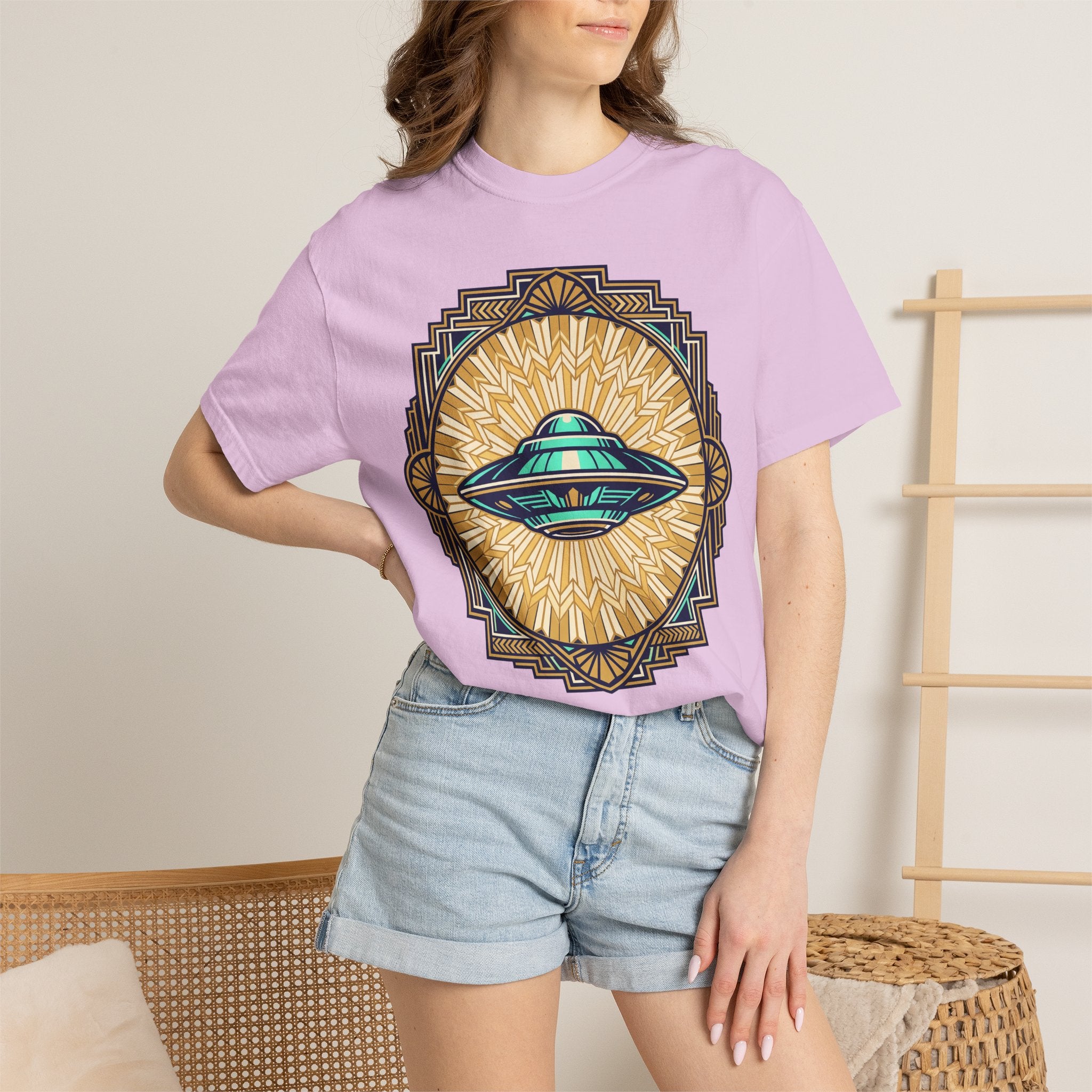 Purple UFO graphic T-shirt with teal flying saucer emblem at chest