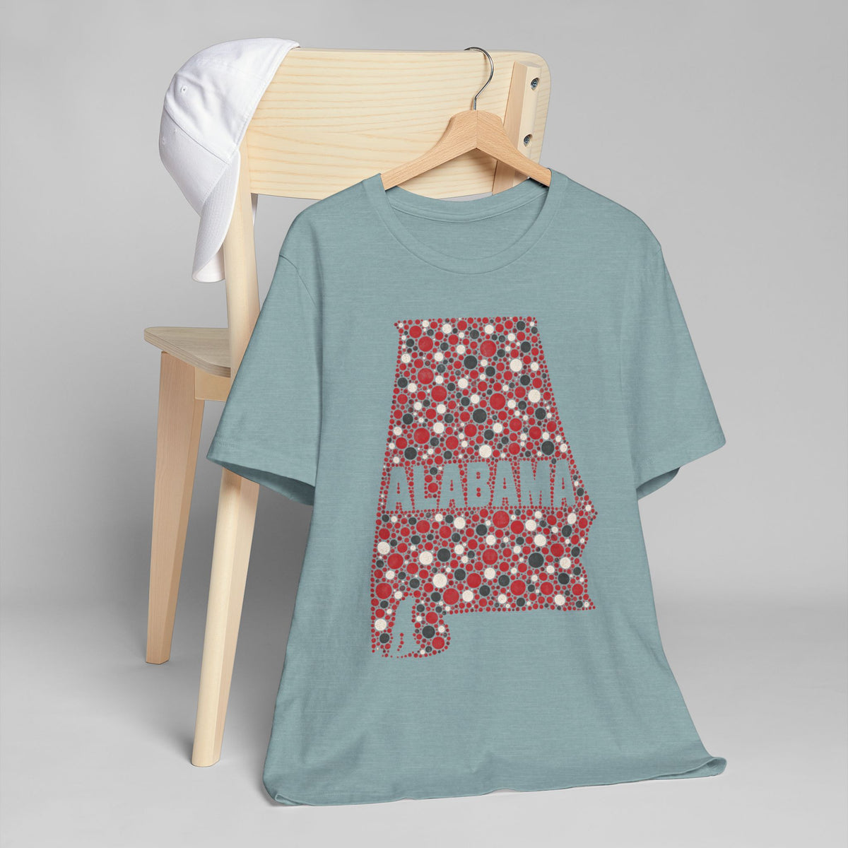 Teal short-sleeve T-shirt with red floral Alabama state outline graphic