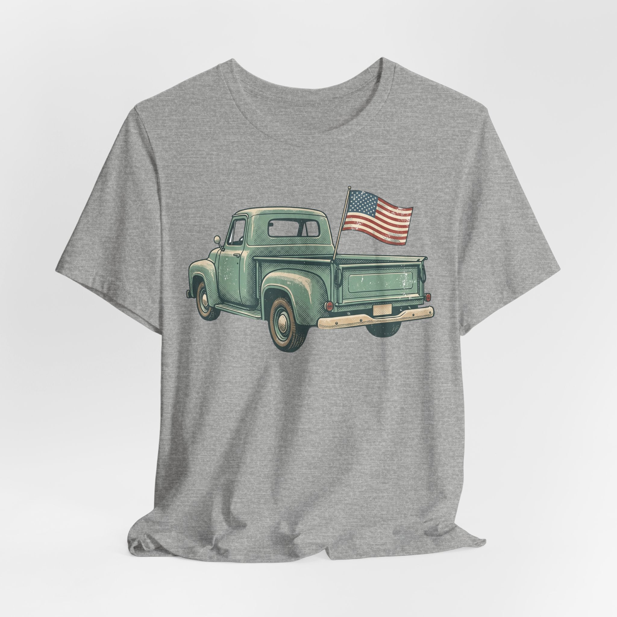Dark heather gray crewneck t-shirt with green pickup truck and American flag chest print