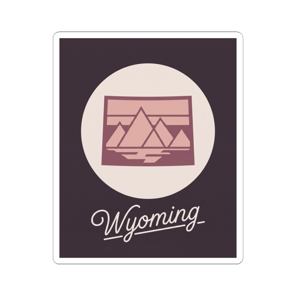 Wyoming kiss-cut decal featuring pink mountain scene icon and cursive “Wyoming”