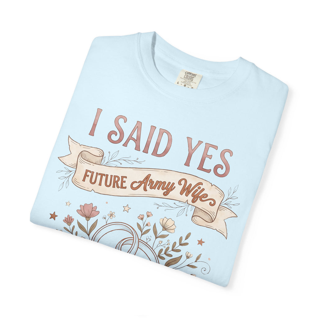 Light blue T-shirt with floral ribbon graphic and “I SAID YES” text on front.