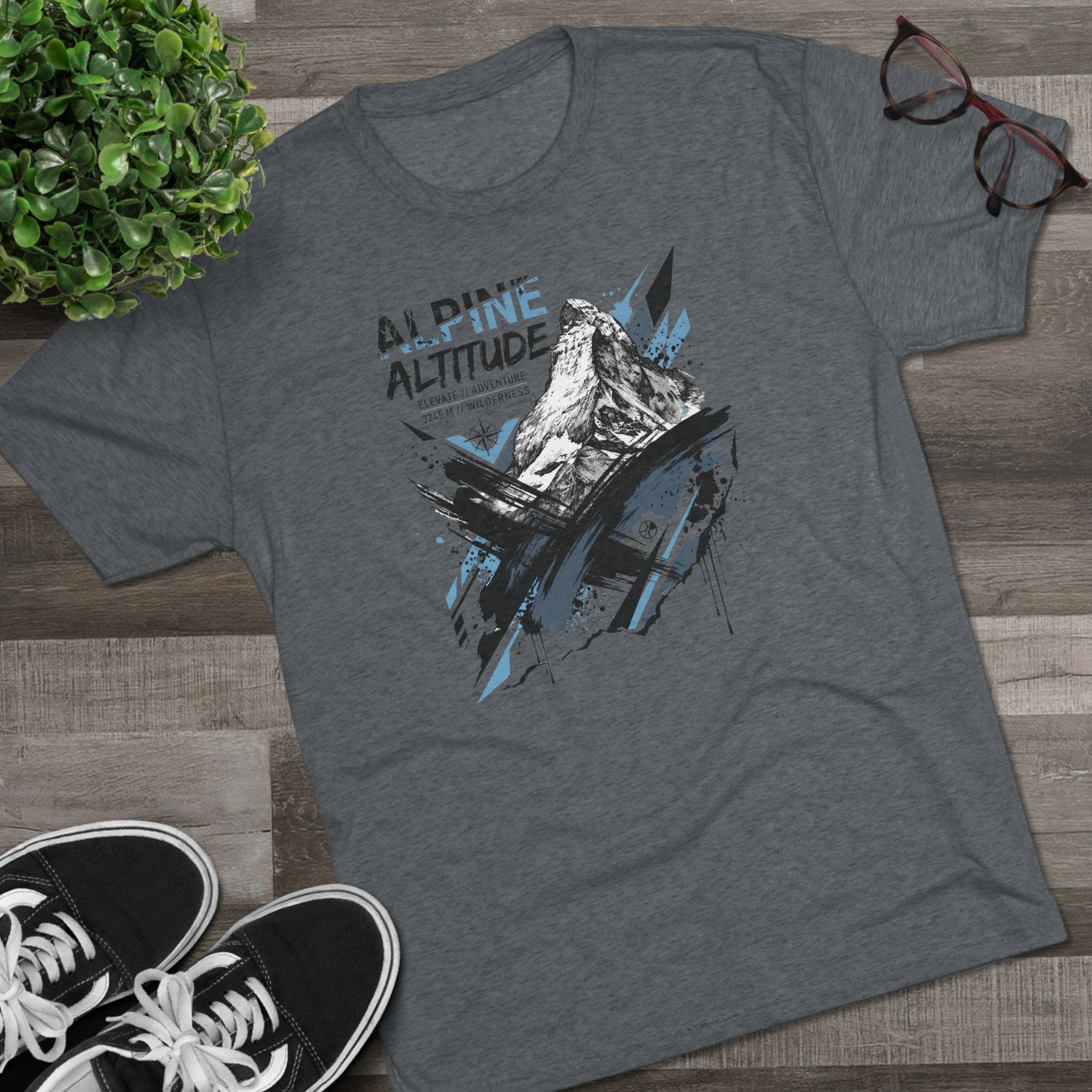 Graphic hiking T-shirt in blue heather gray, mountain peak illustration and blue text