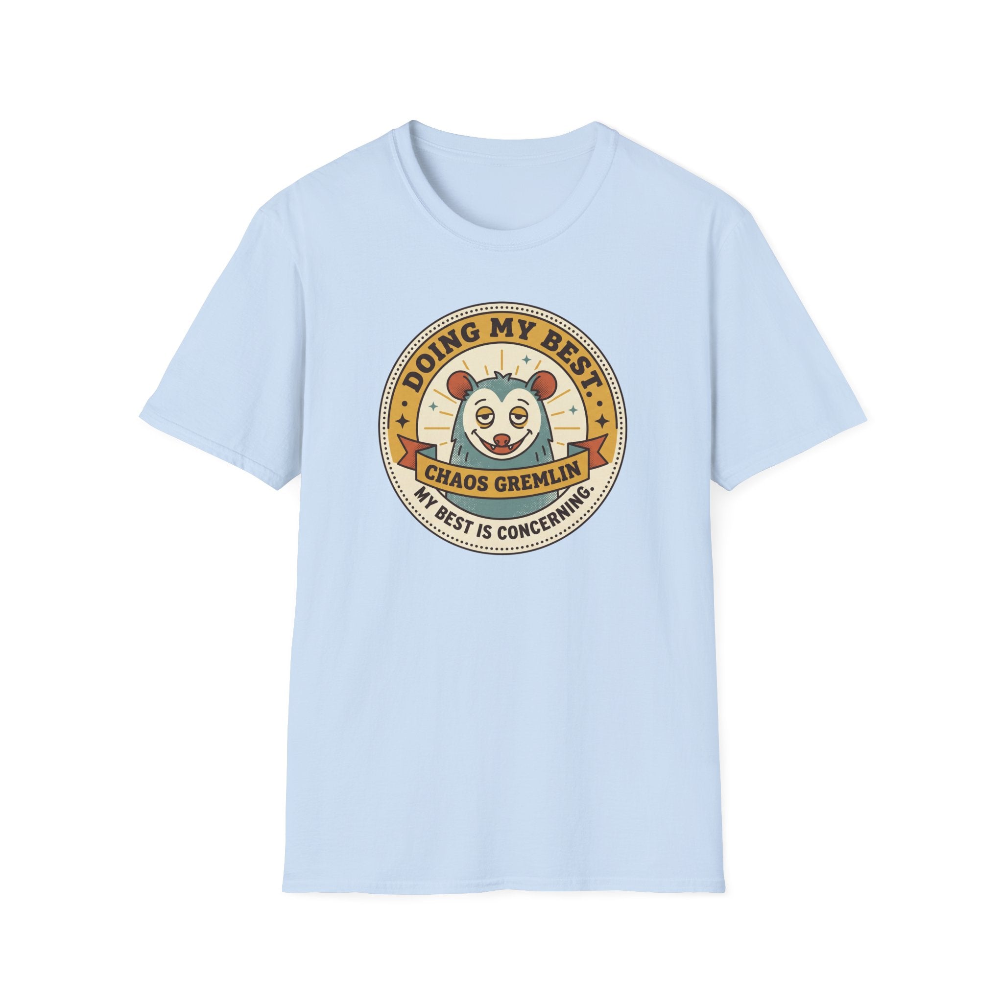 Light blue crew-neck T-shirt with round 'Doing My Best Chaos Gremlin' cartoon badge