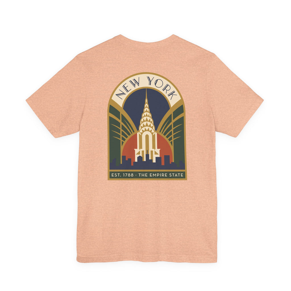 Peach T-shirt with large round New York skyline emblem graphic