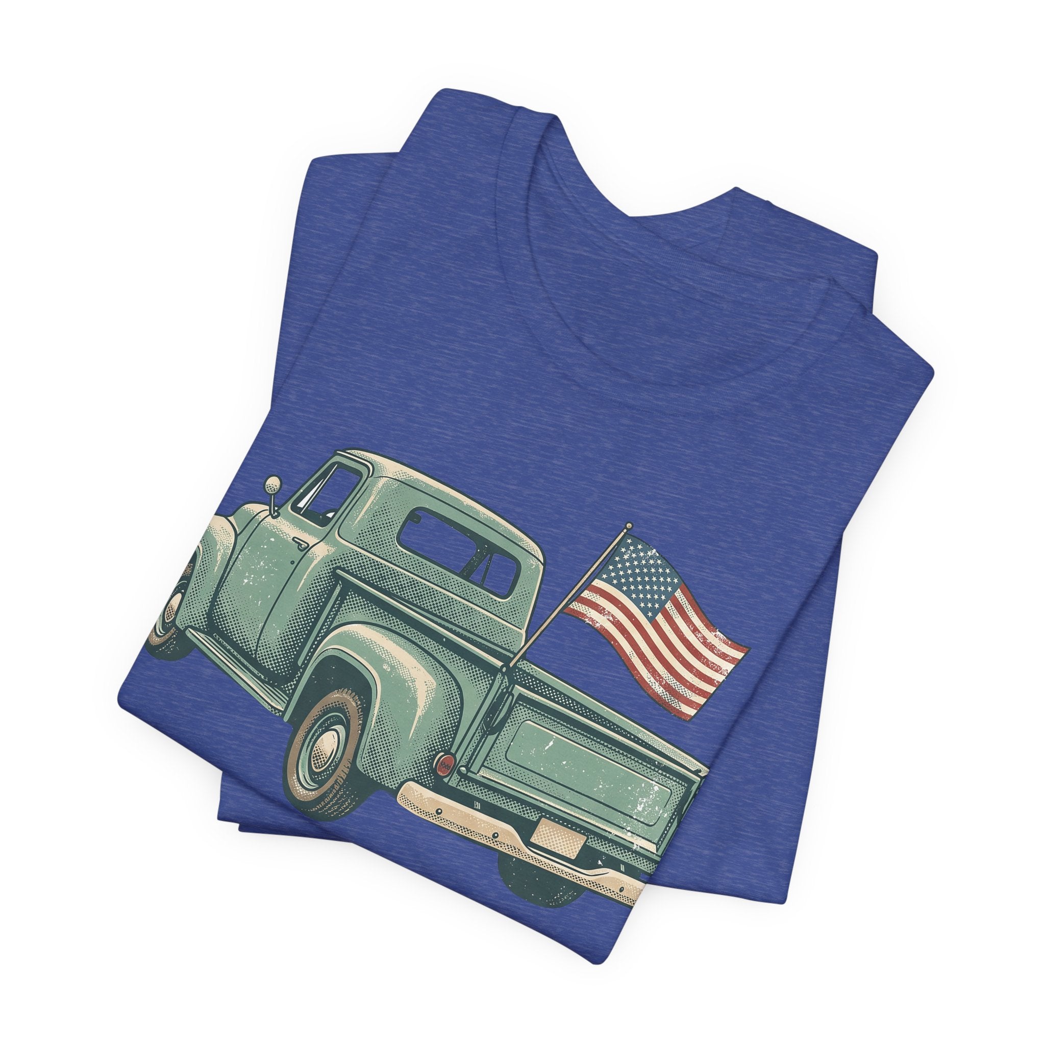 Blue T-shirt with vintage green pickup truck graphic and small American flag.