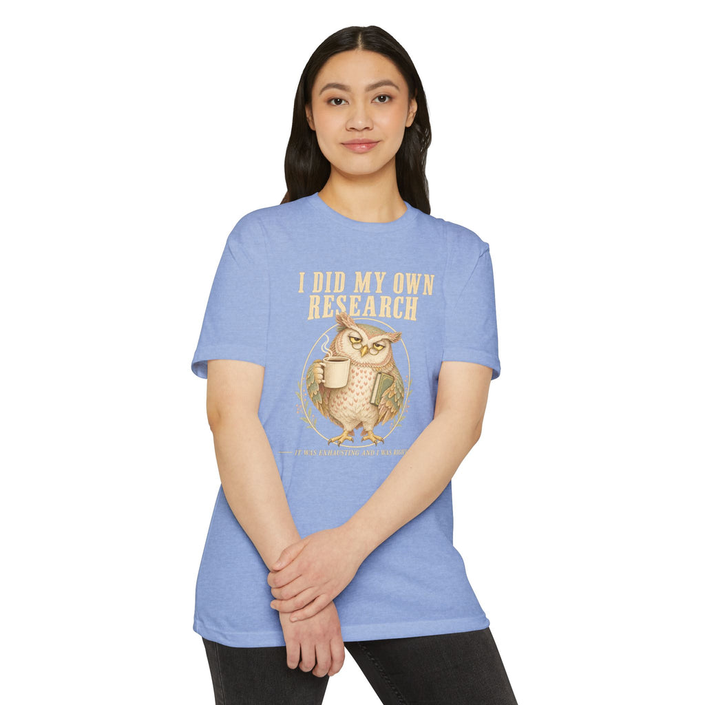 Light blue t-shirt with owl illustration and “I did my own research” on front