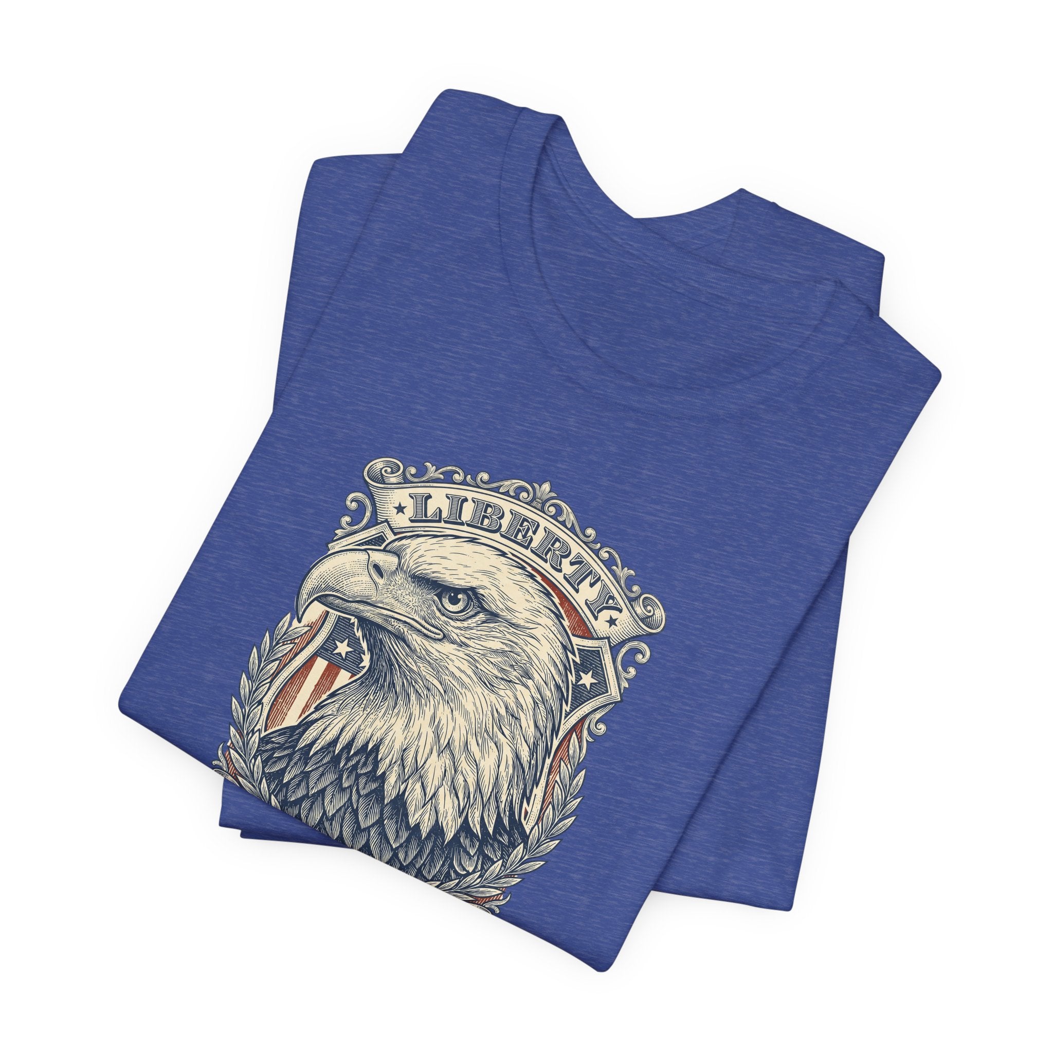 Blue crewneck t-shirt with eagle head graphic and laurel emblem on front.