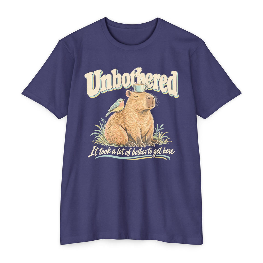Purple T-shirt with unbothered capybara holding a coffee cup graphic