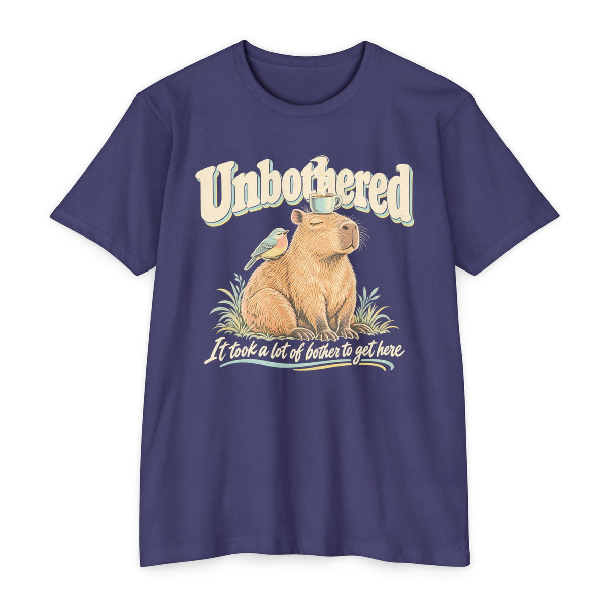 Purple T-shirt with unbothered capybara holding a coffee cup graphic