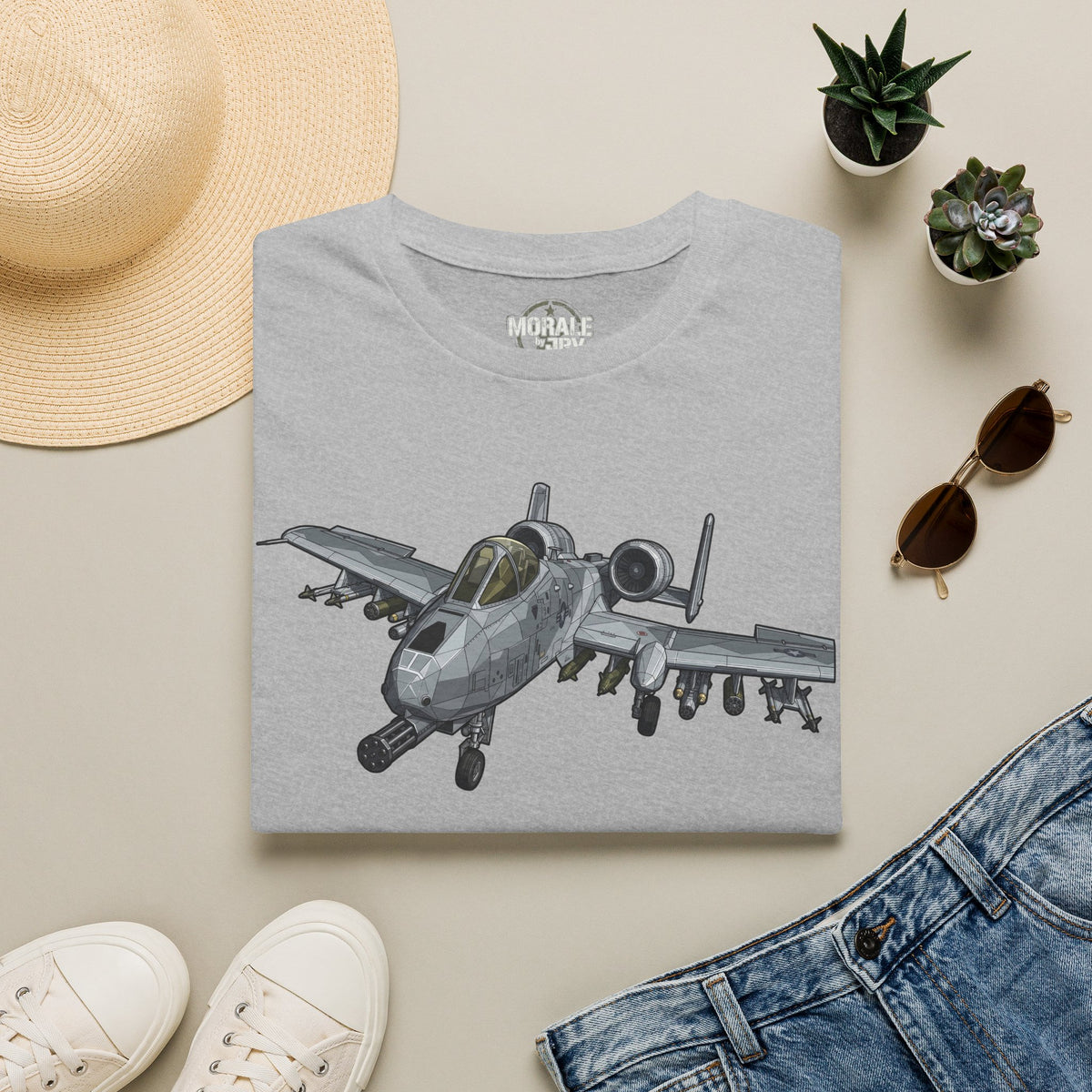 Light gray crew-neck t-shirt with gray fighter jet graphic