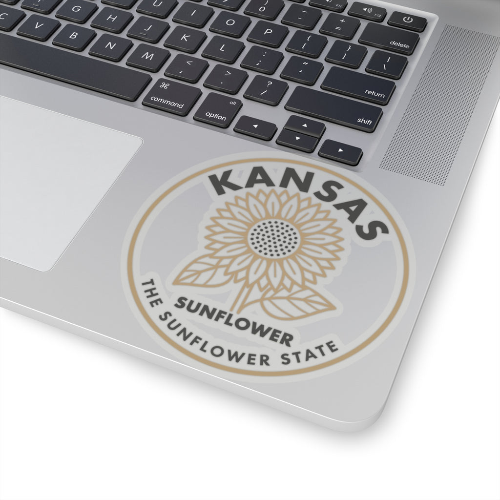 Circular vinyl decal featuring Kansas sunflower and text, beige and gray on white