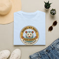 Light blue t-shirt with circular gremlin panda graphic and text at the center