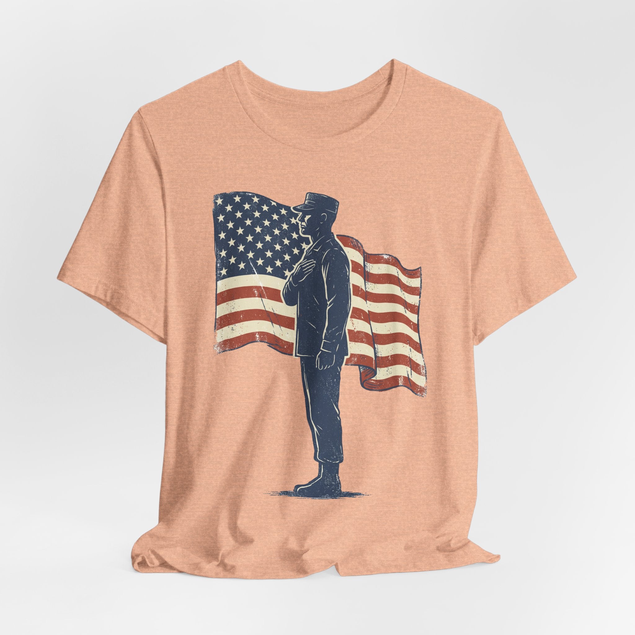 Light peach T-shirt with standing soldier silhouette and waving American flag graphic