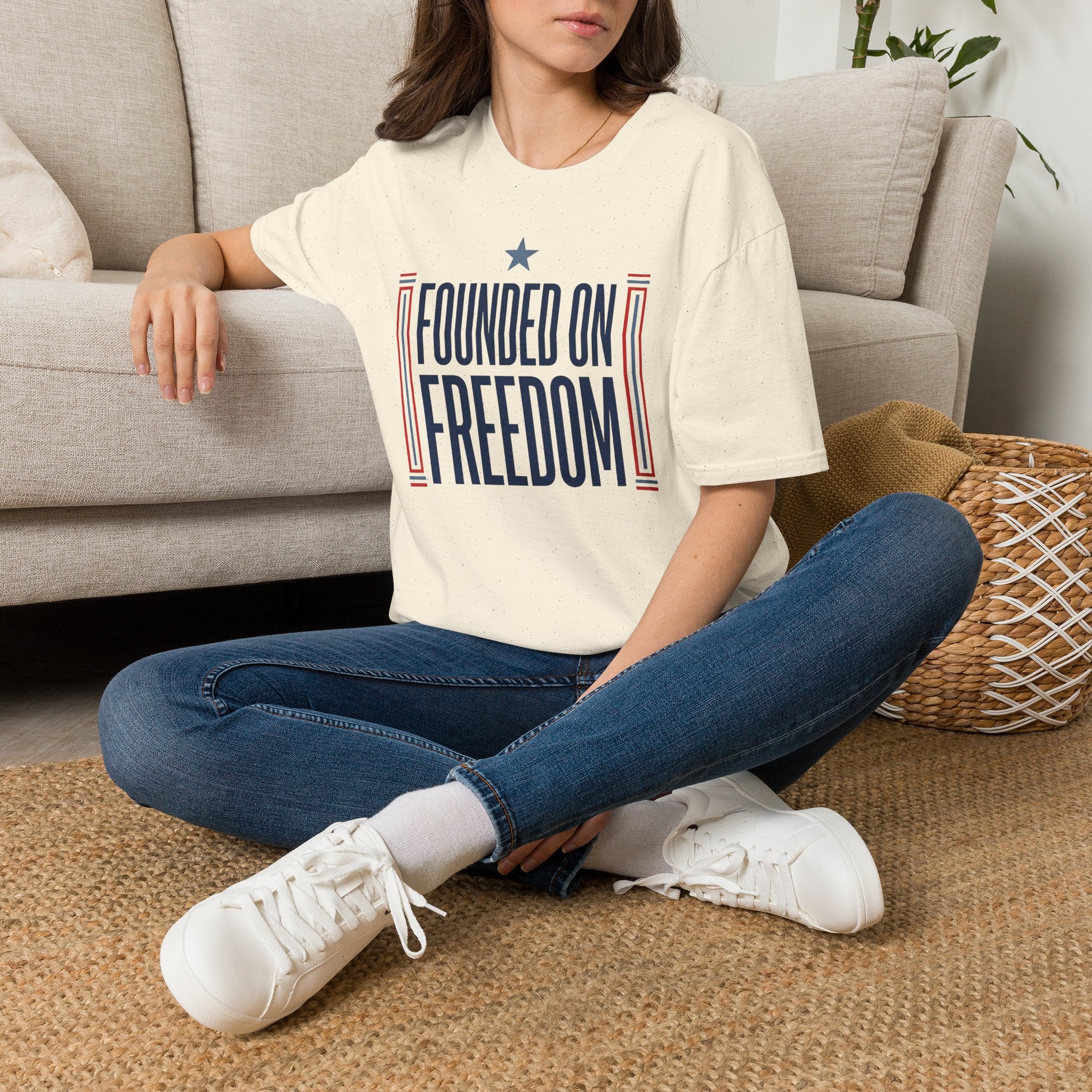 Cream T-shirt with patriotic graphic text "Founded on Freedom" on front