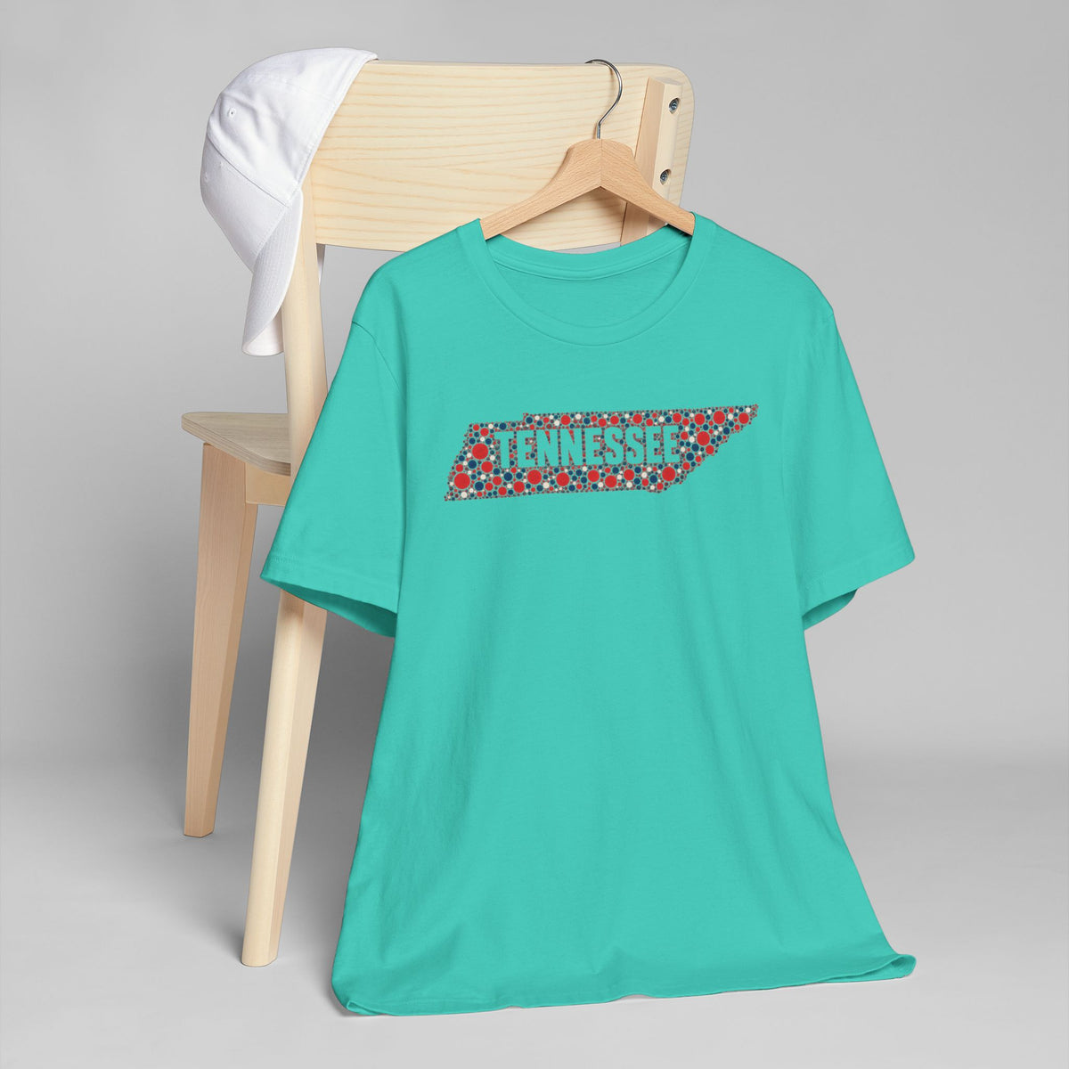 Teal crewneck T-shirt with colorful Tennessee outline floral graphic