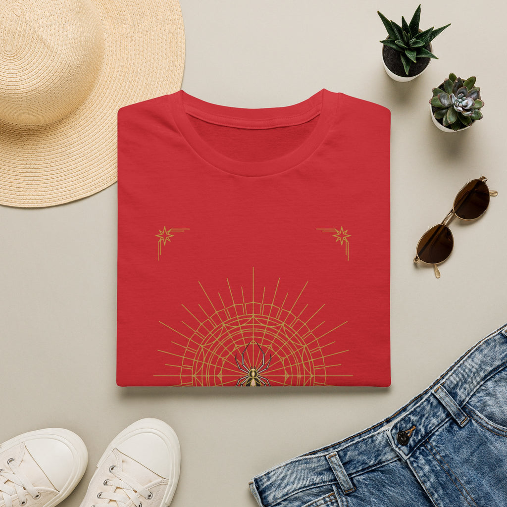 Red T-shirt with gold spider web mandala and small star accents on the chest