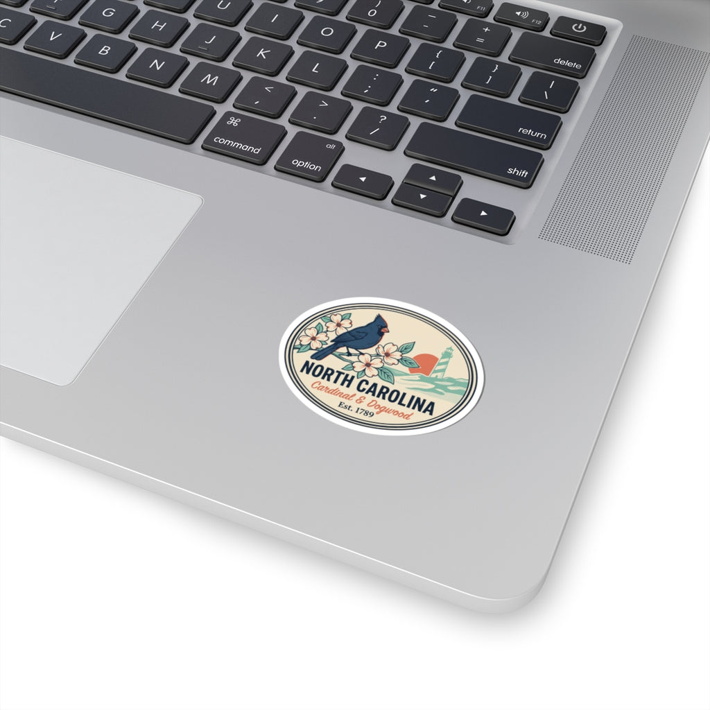 North Carolina state badge vinyl sticker with cardinal and dogwood in oval frame
