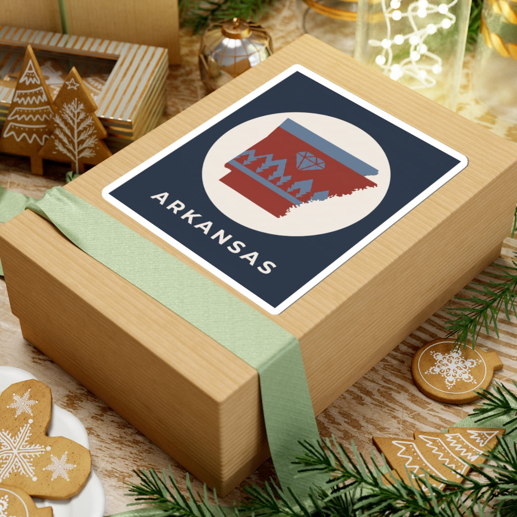Arkansas emblem sticker on wrapped gift, diamond and pine tree graphic with ARKANSAS