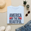 Light blue T-shirt with “America the Beautiful” patriotic graphic on front