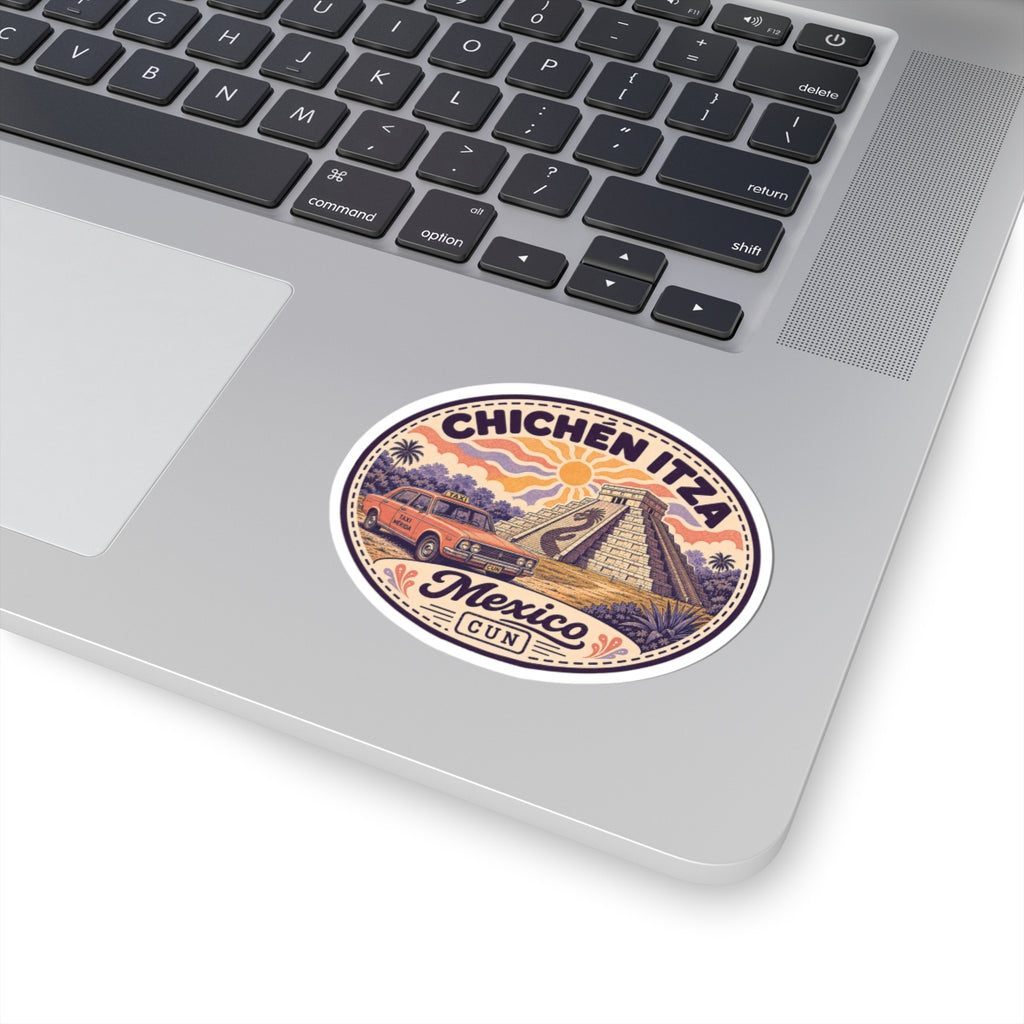 Round Chichen Itza pyramid sticker with taxi graphics and “Mexico CUN” on a laptop.