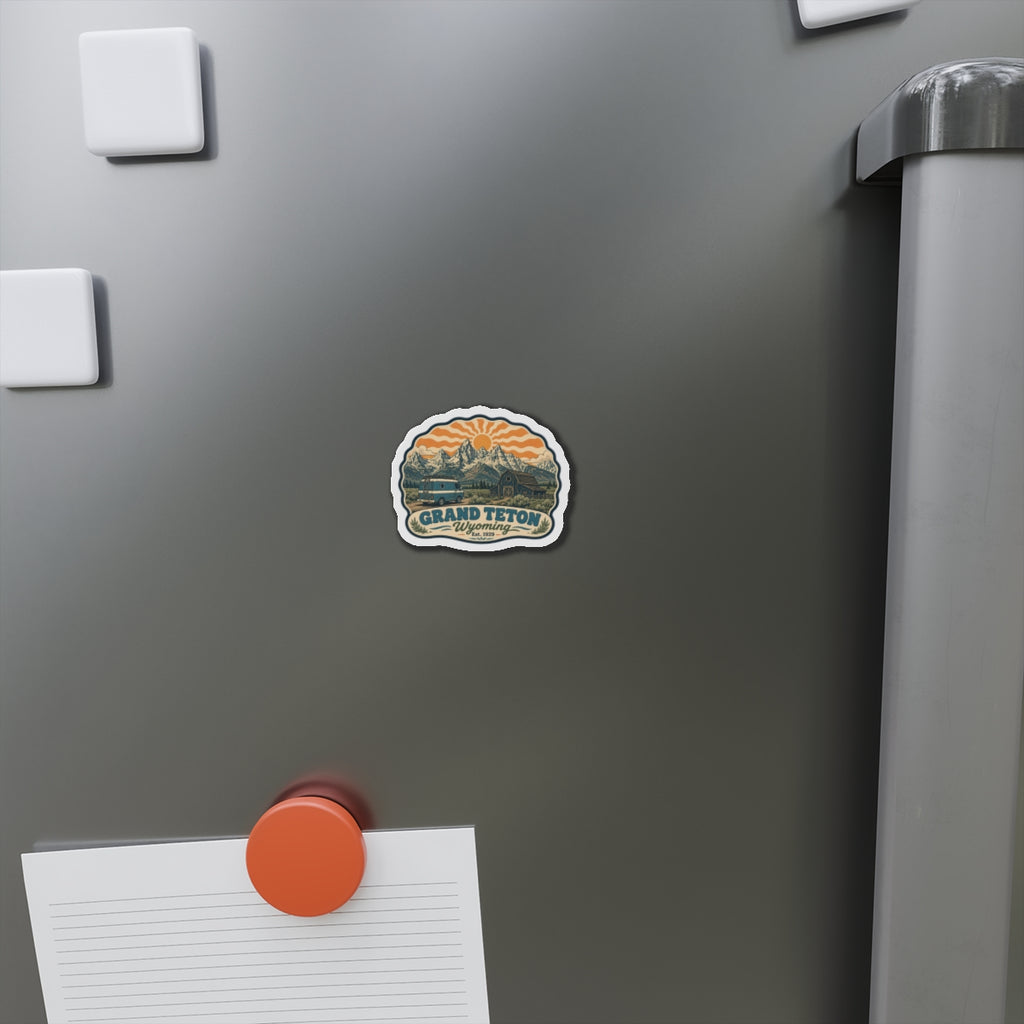 Grand Teton die-cut fridge magnet adhered to a stainless refrigerator door