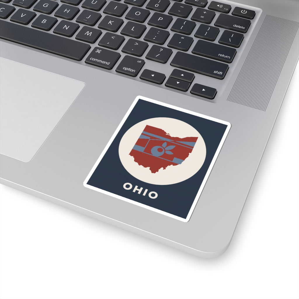 Ohio sticker on a laptop keyboard, square design with map, apple icon, and OHIO text