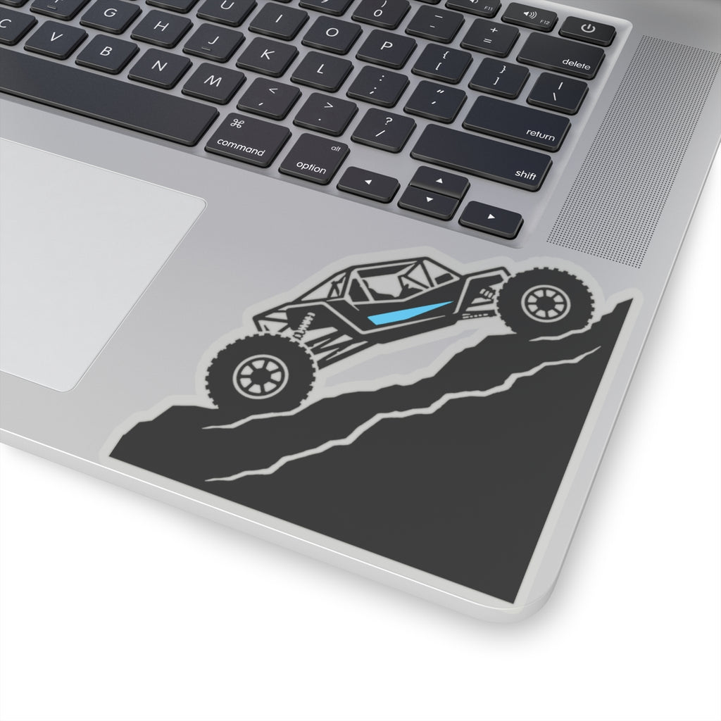 Transparent off-road truck sticker on laptop screen bezel: blue stripe on dark road