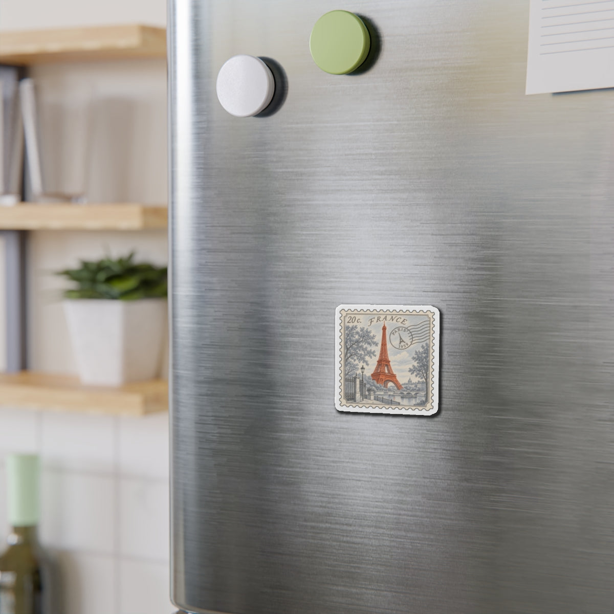 Eiffel Tower stamp magnet on stainless fridge, '20c France' retro illustration
