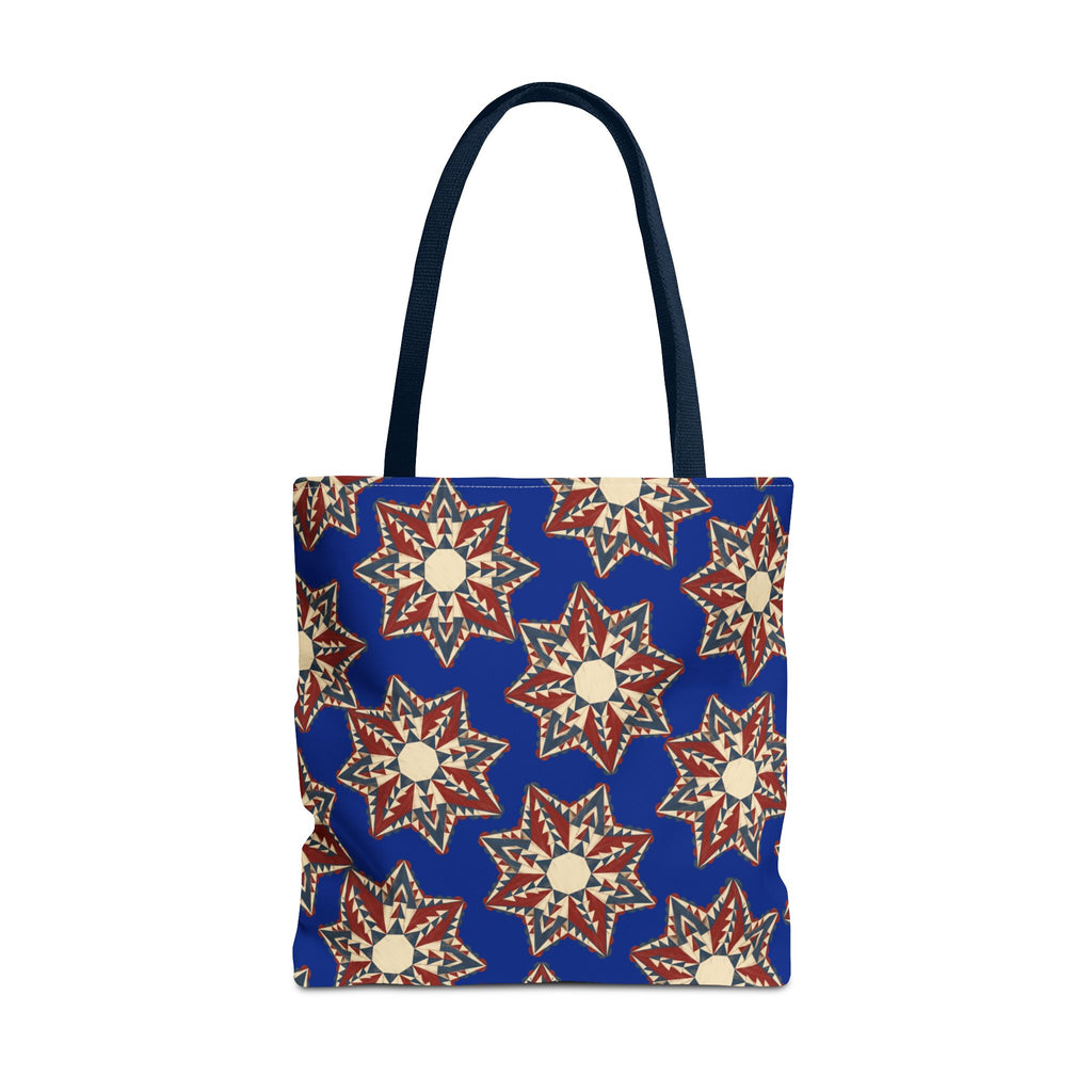 Blue tote bag with starburst floral mandala pattern and navy handles, front view