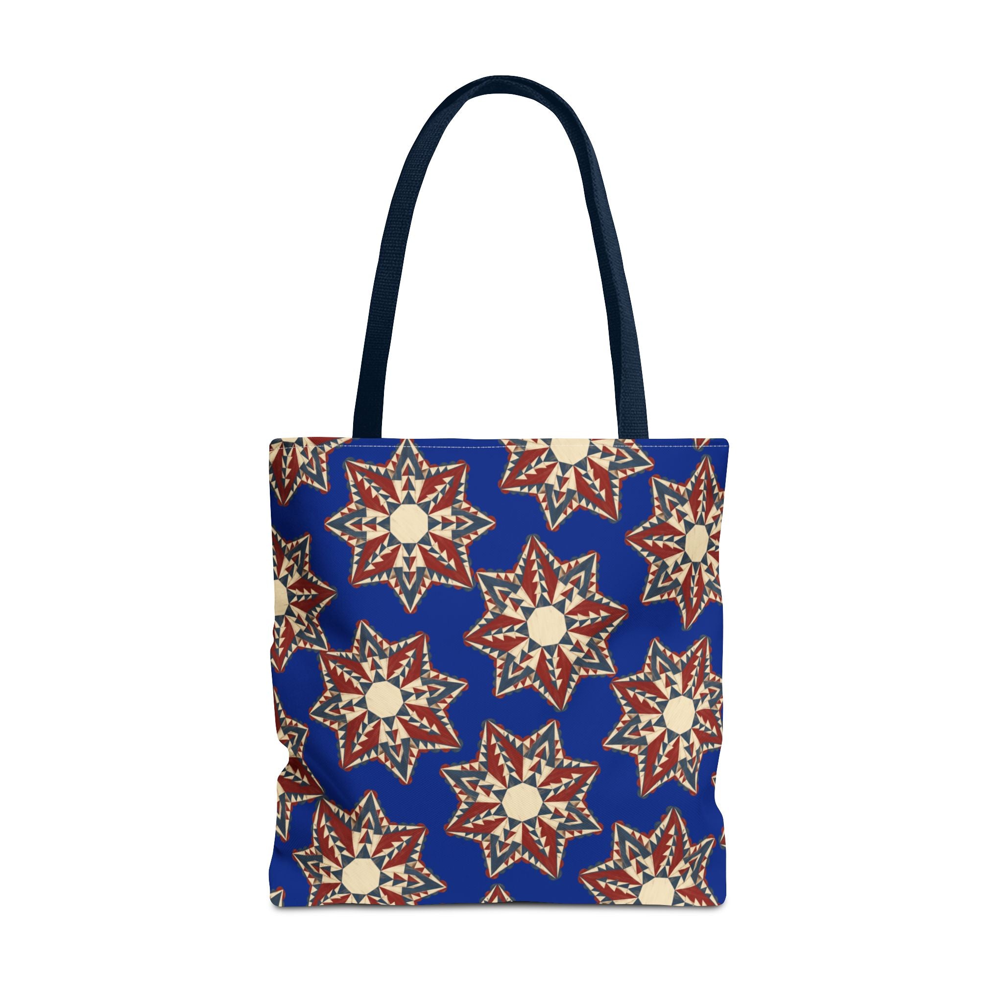 Blue tote bag with starburst floral mandala pattern and navy handles, front view