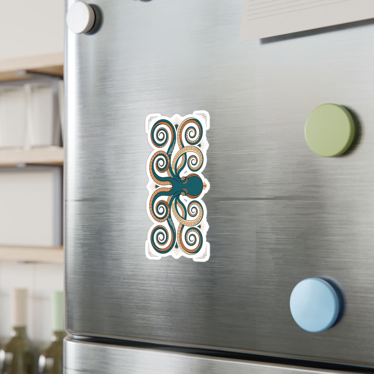 Ornate octopus sticker on brushed metal fridge: teal body with orange swirls