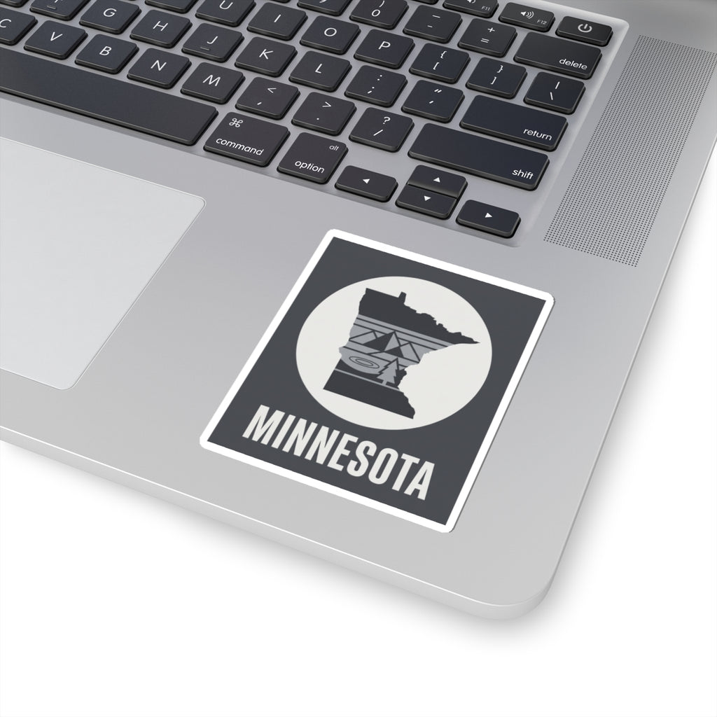 Minnesota logo kiss-cut sticker on laptop keyboard with “MINNESOTA” label