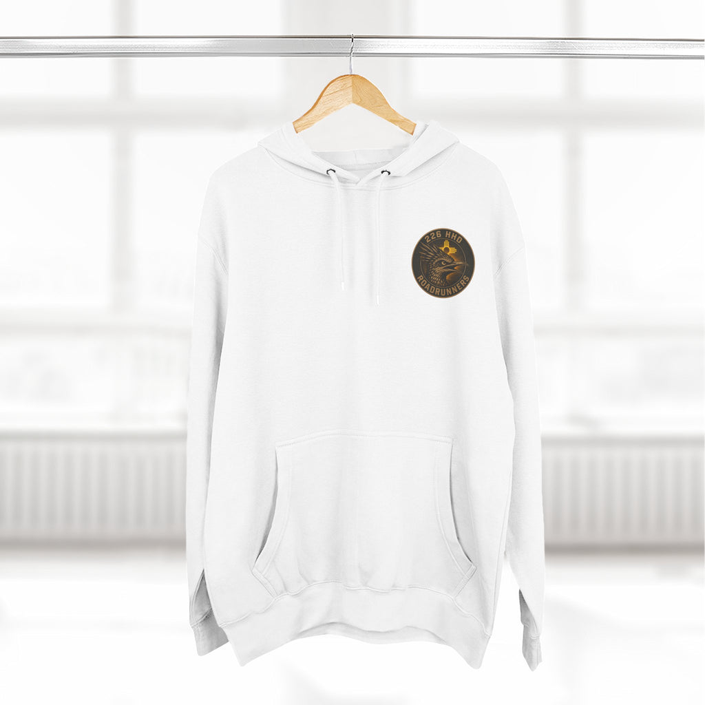White pullover hoodie on hanger, hood and front pocket with chest patch