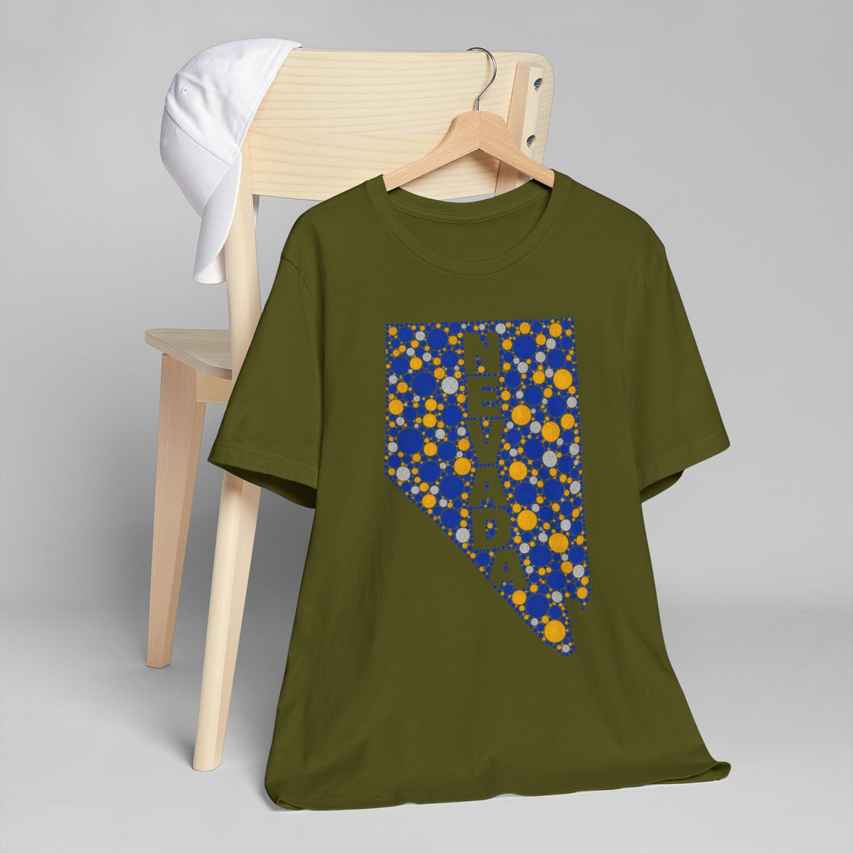 Olive green crew-neck t-shirt with blue and gold patterned Nevada map graphic