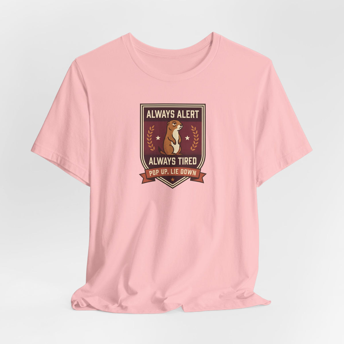 Light pink crewneck T-shirt with squirrel crest badge graphic centered